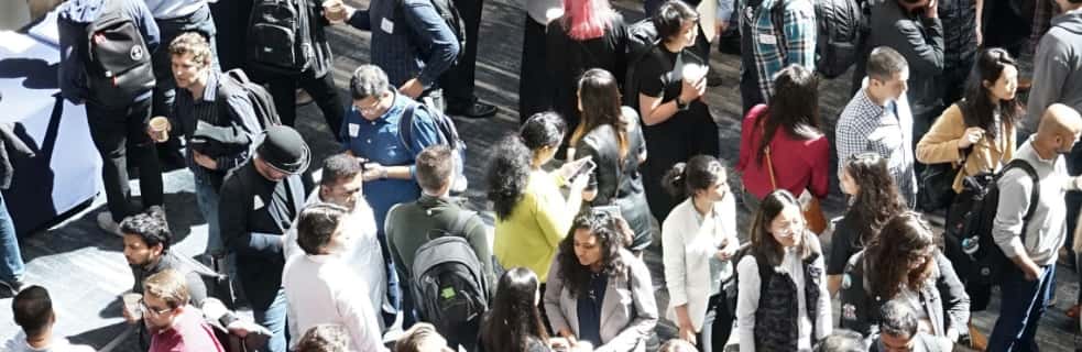 An aerial view of a crowded conference hall