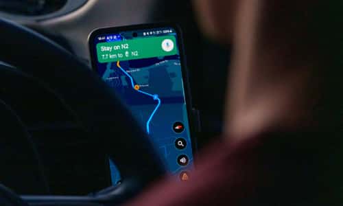 A phone showing turn-by-turn GPS navigation